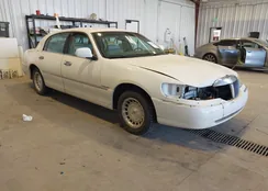 1LNHM81W4XY681649: 44186764