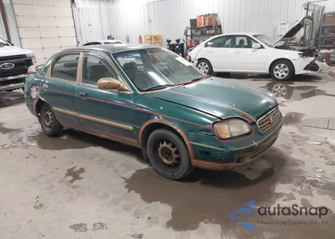2001 Suzuki Esteem Gl/Glx/Glx+ из США, поврежденный, VIN JS2GB41S315207671
