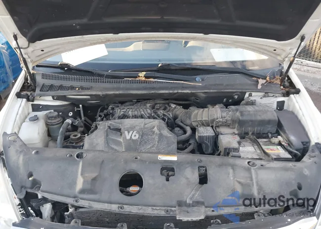 KNDMG4C77C6488734: 38009975