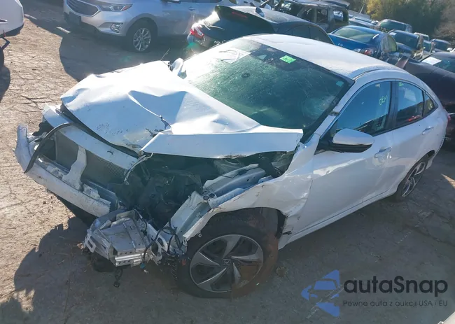 2HGFC2F66LH543606: 38140953