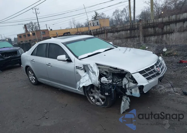 1G6DW6ED5B0104083: 38498295