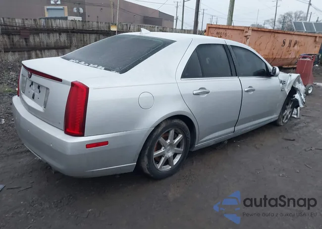 1G6DW6ED5B0104083: 38498295