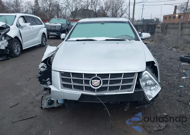 1G6DW6ED5B0104083: 38498295