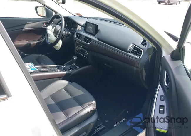 JM1GJ1W55G1468475: 37684954