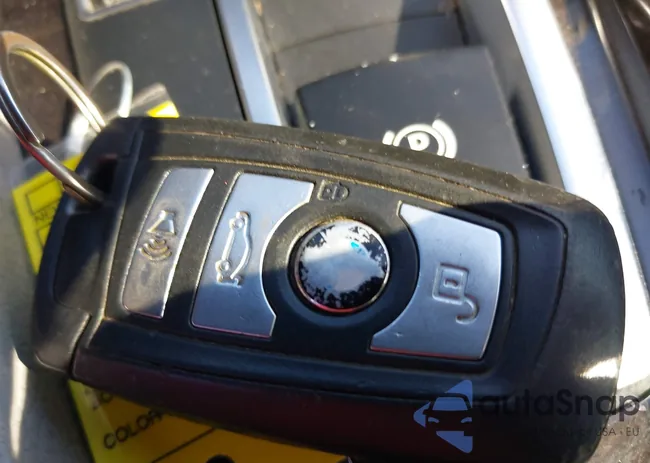 WBAXG5C53CDX02404: 37845435