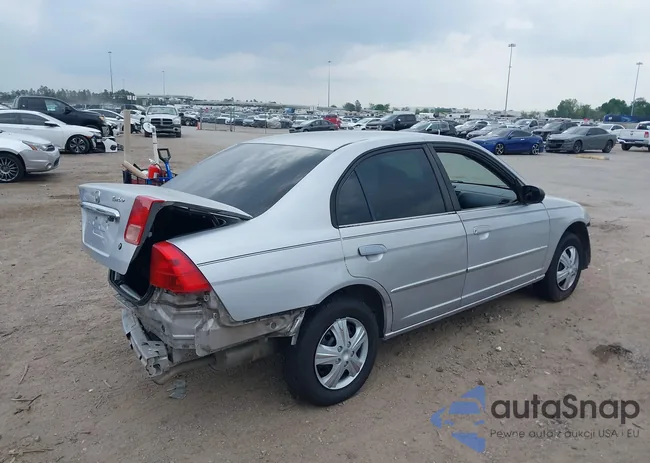 1HGES15502L021945: 38989683