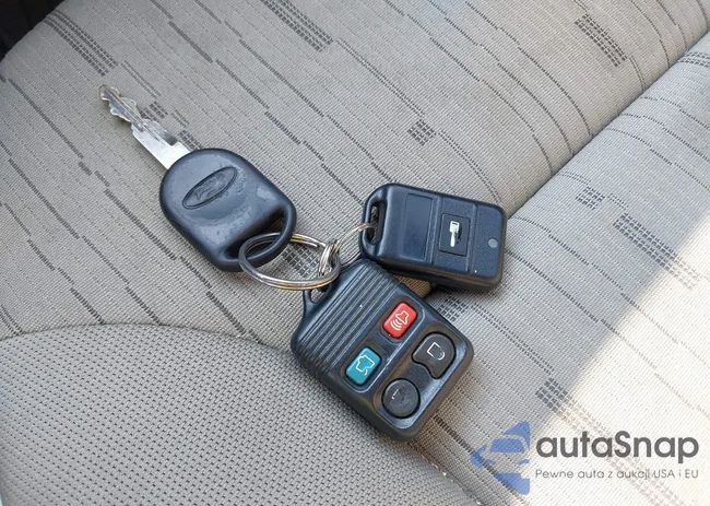 1FAHP3FNXBW111034: 40050562