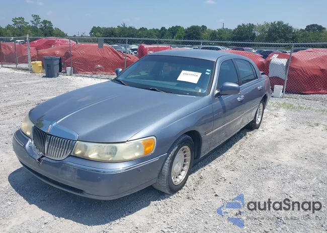 1LNHM81W2XY695002: 40059918