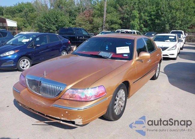 1LNHM83WX3Y633077: 40069743