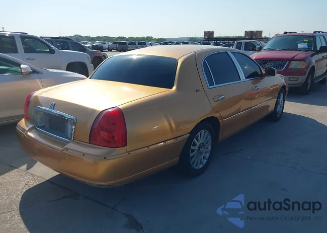 1LNHM83WX3Y633077: 40069743