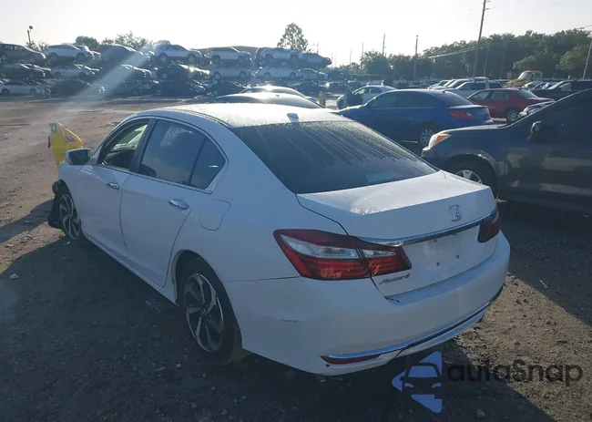 1HGCR2F89GA112619: 40279455