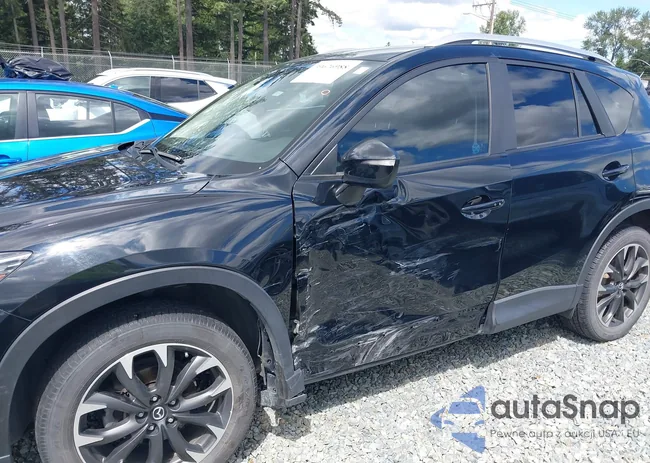 JM3KE4DYXG0797618: 39676988