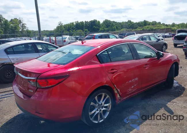 JM1GJ1W62E1128836: 39759396