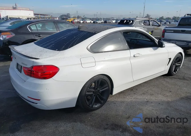 WBA3N3C5XEF710869: 40984116