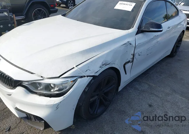 WBA3N3C5XEF710869: 40984116