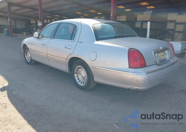 1LNFM81W3WY617074: 40528028