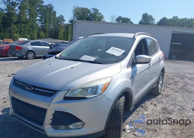 1FMCU0GXXEUE39142: 40532641