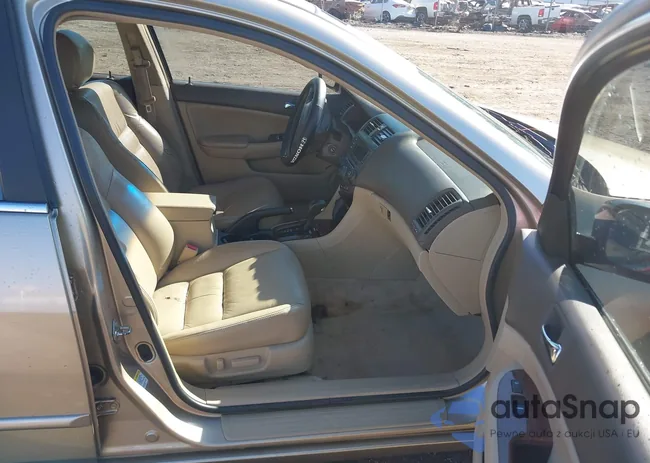 1HGCM66557A047358: 40584561