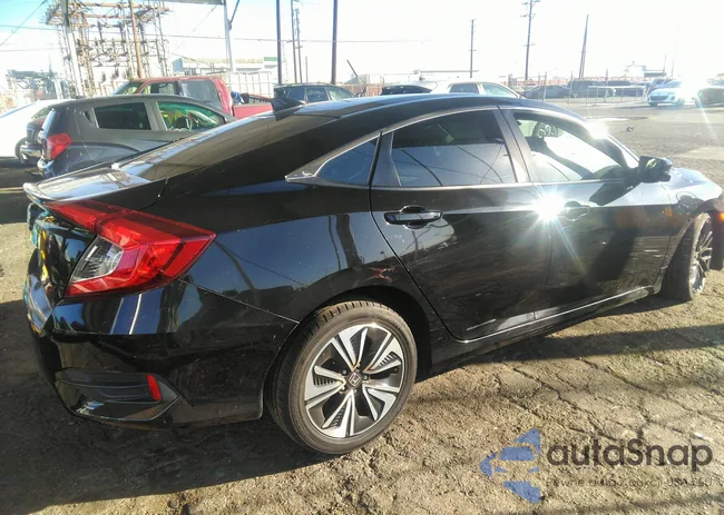 2HGFC1E33JH643175: 40634289