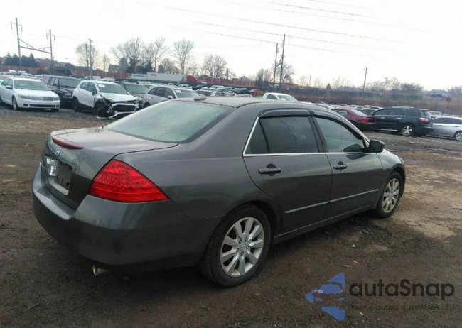 1HGCM66596A027869: 40687851