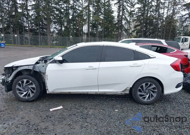 19XFC2F77JE208564: 41933384