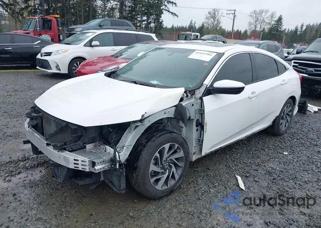 19XFC2F77JE208564: 41933384