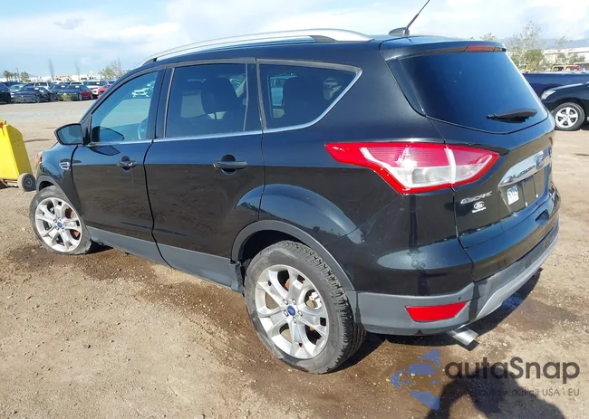 1FMCU0J93EUE37582: 41969532