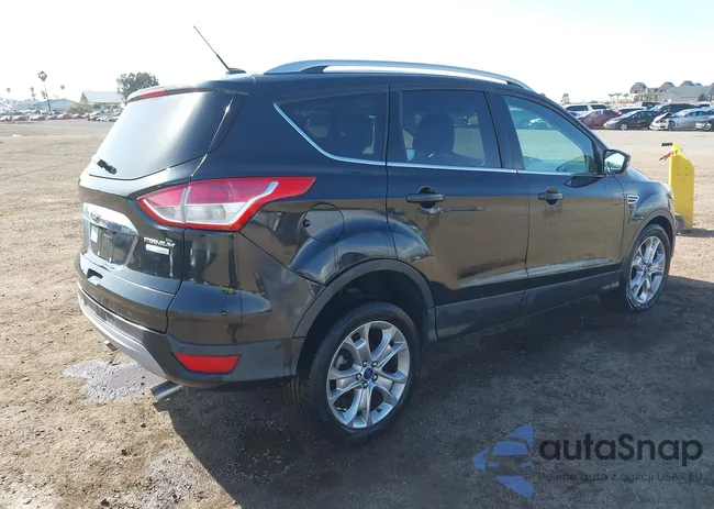 1FMCU0J93EUE37582: 41969532