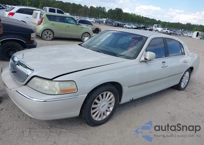 1LNHM81W15Y664112: 42015590