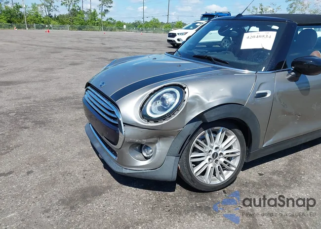 WMWWJ3C06M3M08556: 42040534