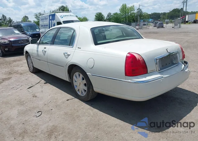 1LNHM83W04Y604592: 42085060