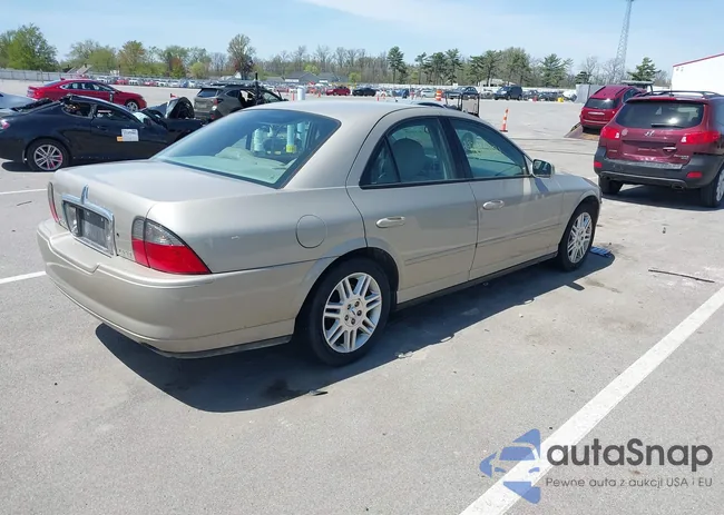 1LNHM87A24Y637754: 42116021