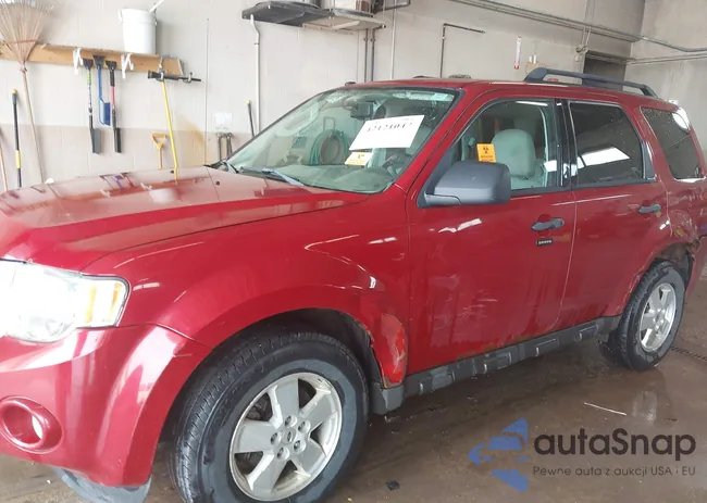 1FMCU9D7XAKD17525: 42121047