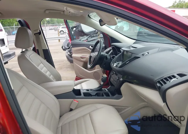 1FMCU0J97HUE84151: 42128542