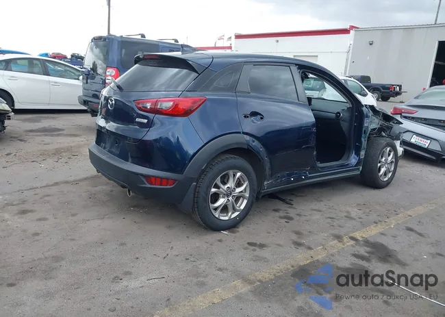 JM1DKFB74K0413034: 42136102