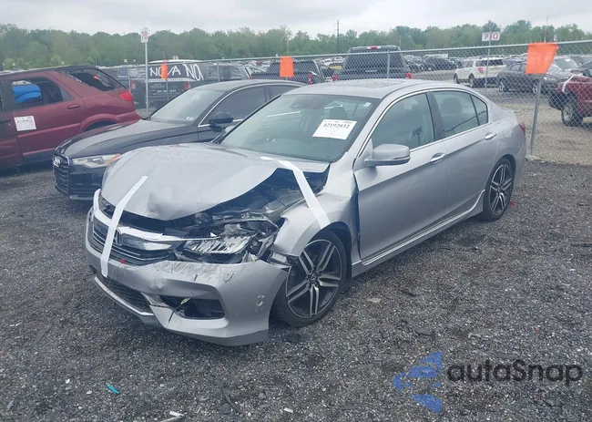 1HGCR3F98HA033961: 42192032