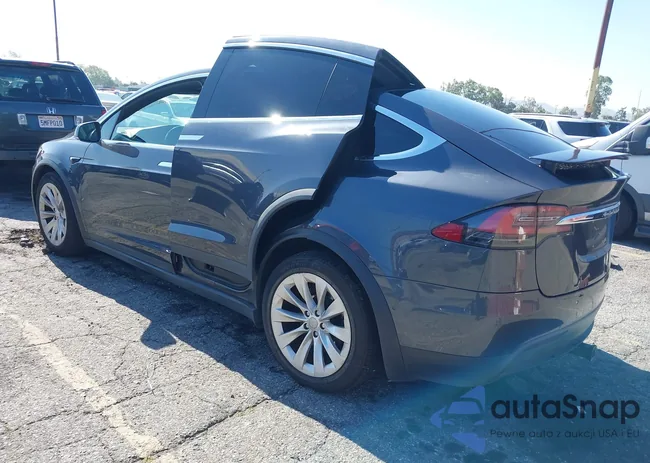 5YJXCAE25GF018477: 42208404