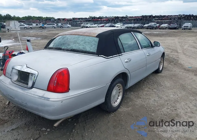 1LNFM82WXWY659028: 42265774