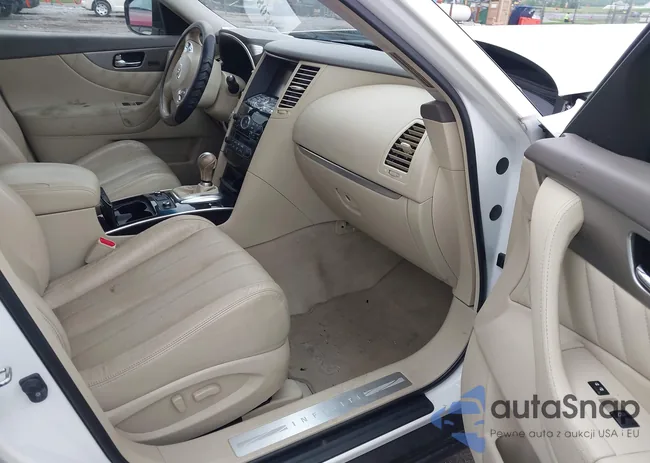 JN8CS1MW4GM400372: 42280369