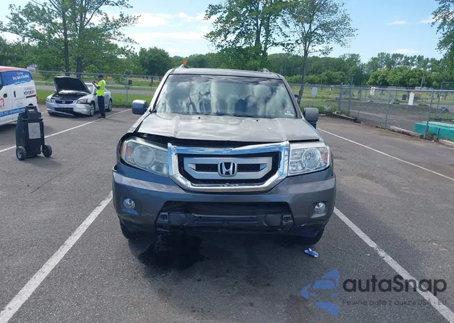 5FNYF4H59BB091184: 42298386