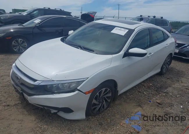 19XFC2F77JE039114: 42300221