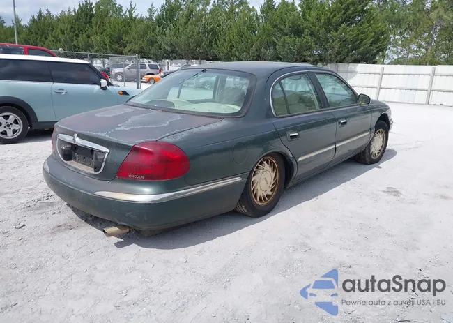 1LNFM97V6WY671313: 42304977