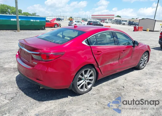 JM1GJ1W69E1133211: 42310673