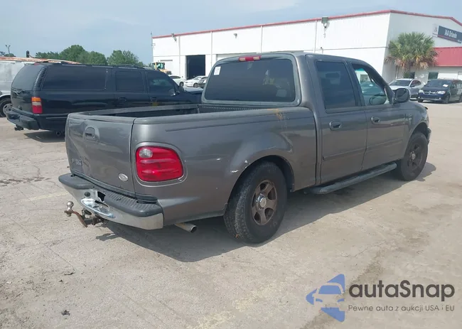 1FTRW076X2KB61396: 42331609