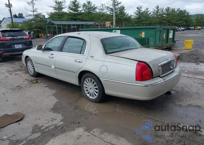 1LNHM82W35Y654826: 42334790