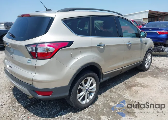 1FMCU0GD8JUD13703: 42372326