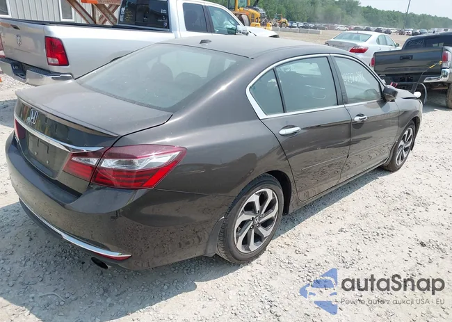 1HGCR2F74GA106282: 42376399