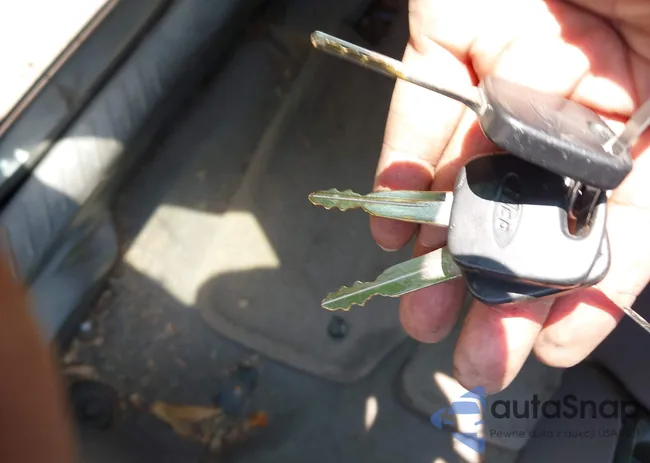 1FMYU041X2KD01548: 42384553