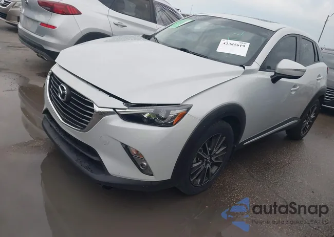 JM1DKDD70H0176312: 42385619