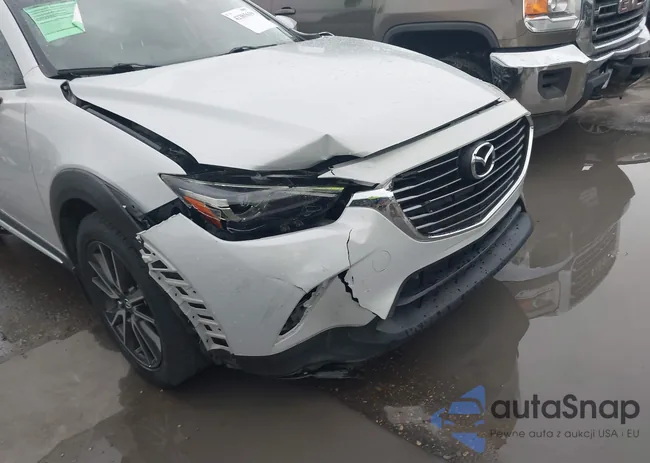 JM1DKDD70H0176312: 42385619